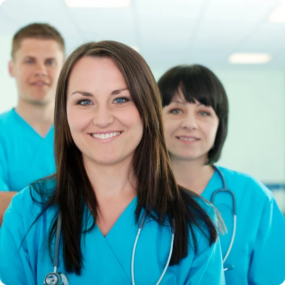 a group of people posing for the camera