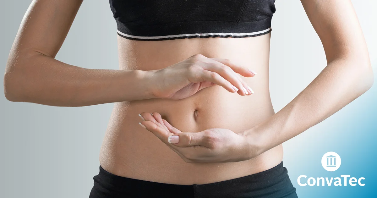 お腹を抱えている女性